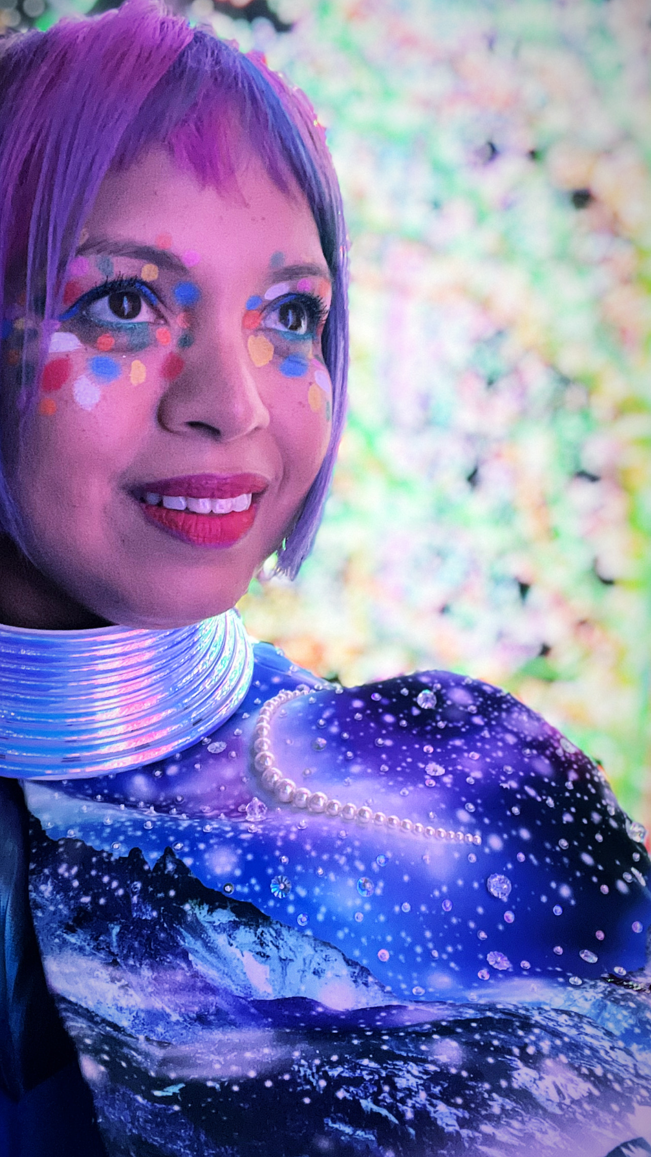 close up selfie with rainbow spot make up and sci-fi costume