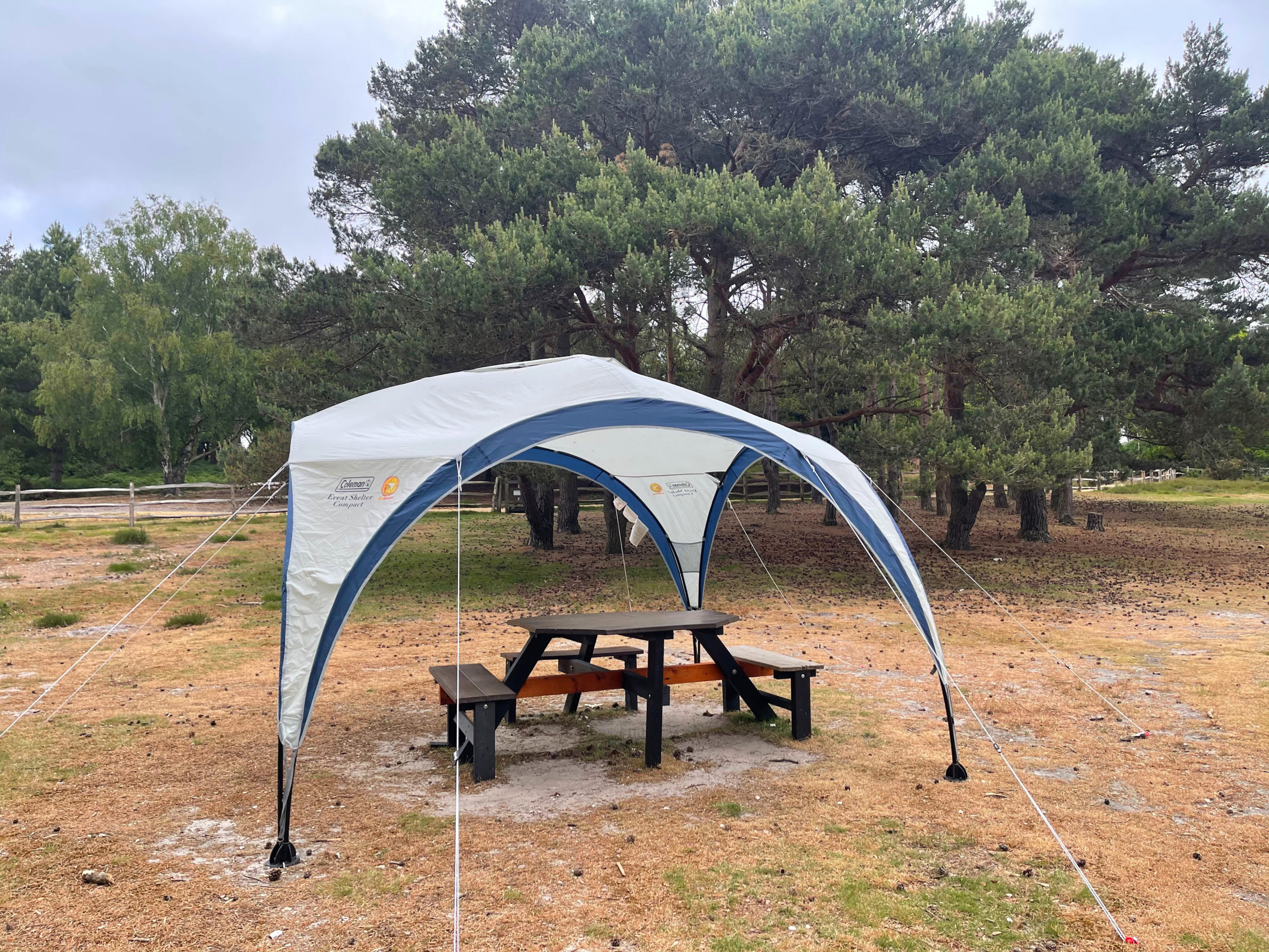 table and chairs with raincover 