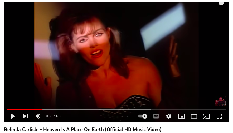 screenshot from the music video of Heaven is  a place on earth