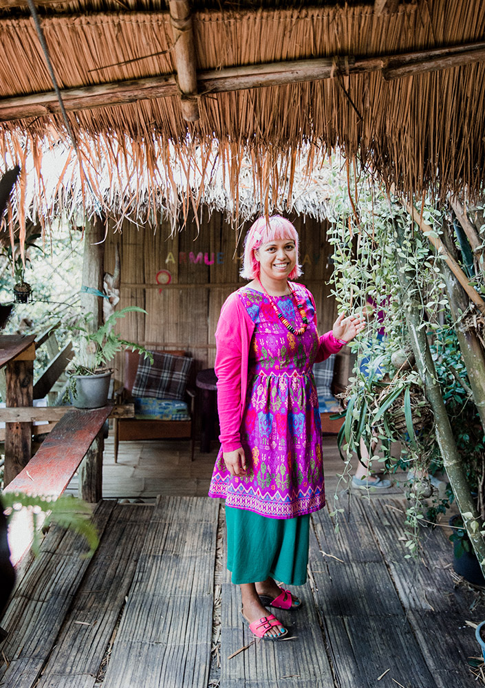 momtaz standing in the courtyard of the homestay