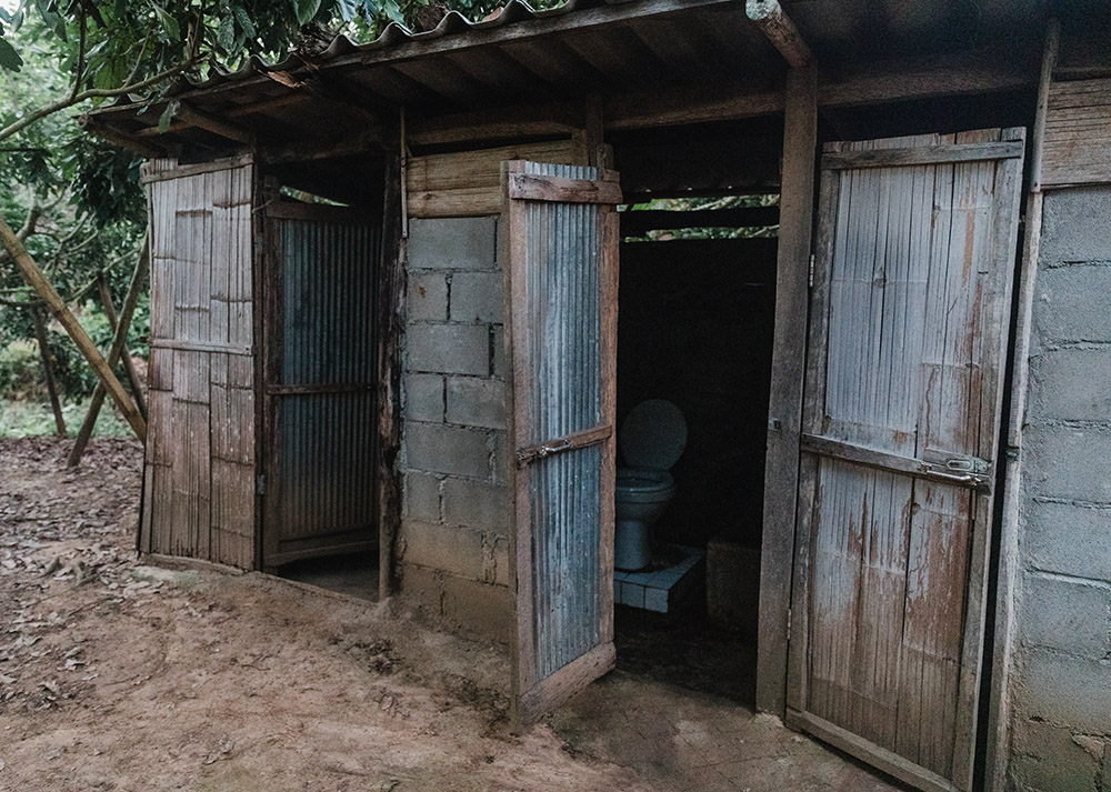 tin and breeze block shower block building