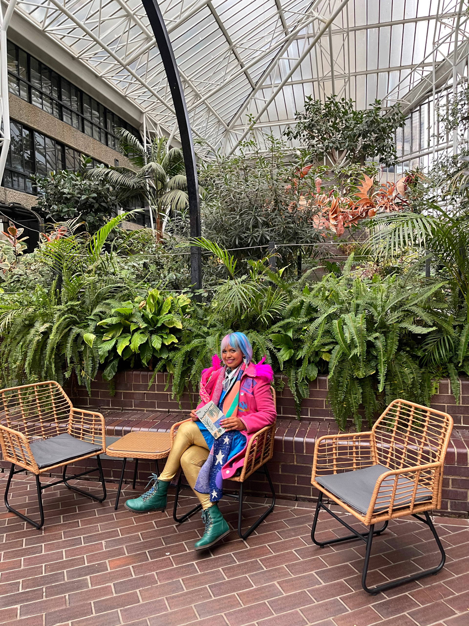 sitting in barbican conservatory wearing my coat made using a heat press