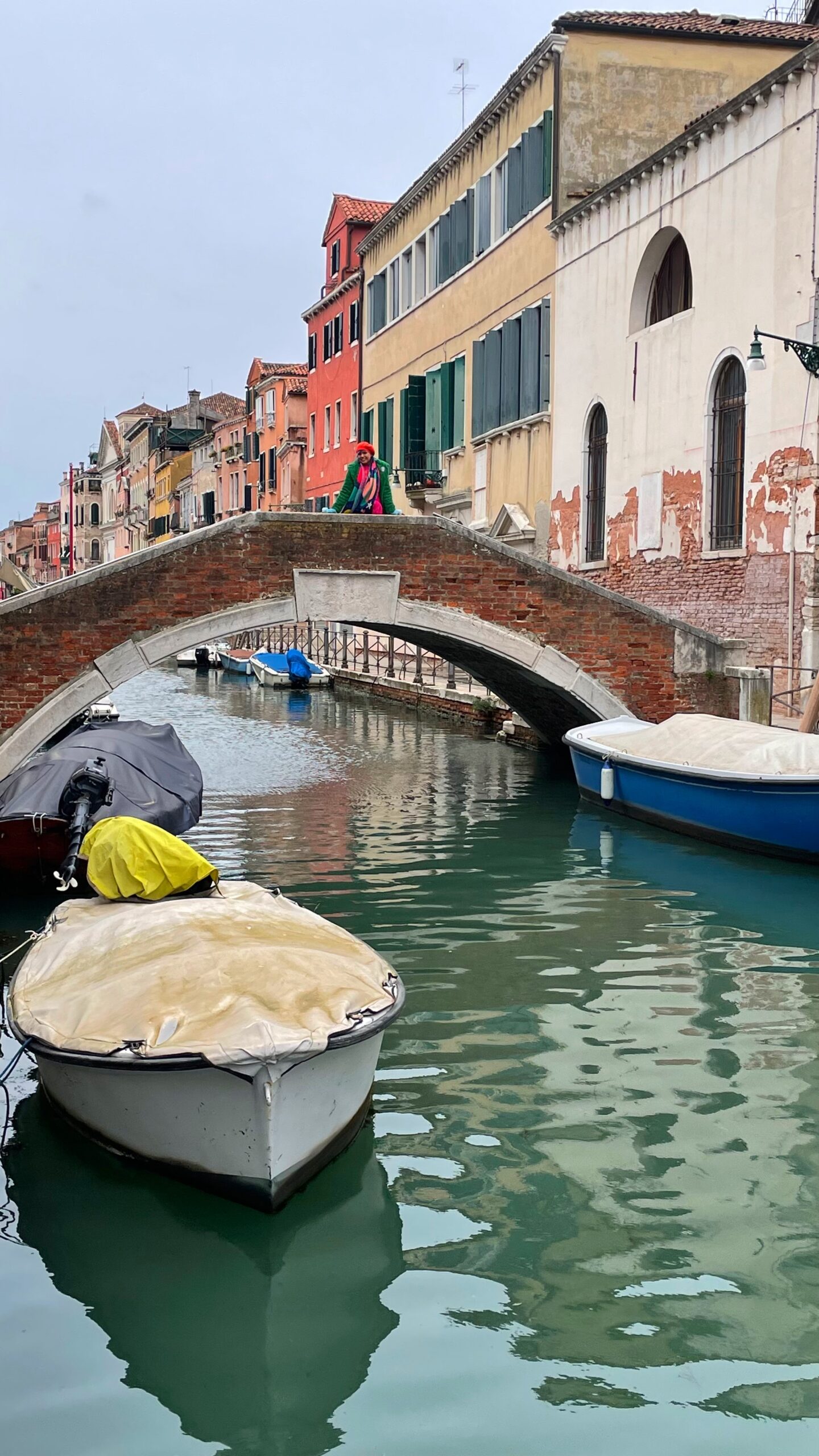 a bridge in venice with boats on water