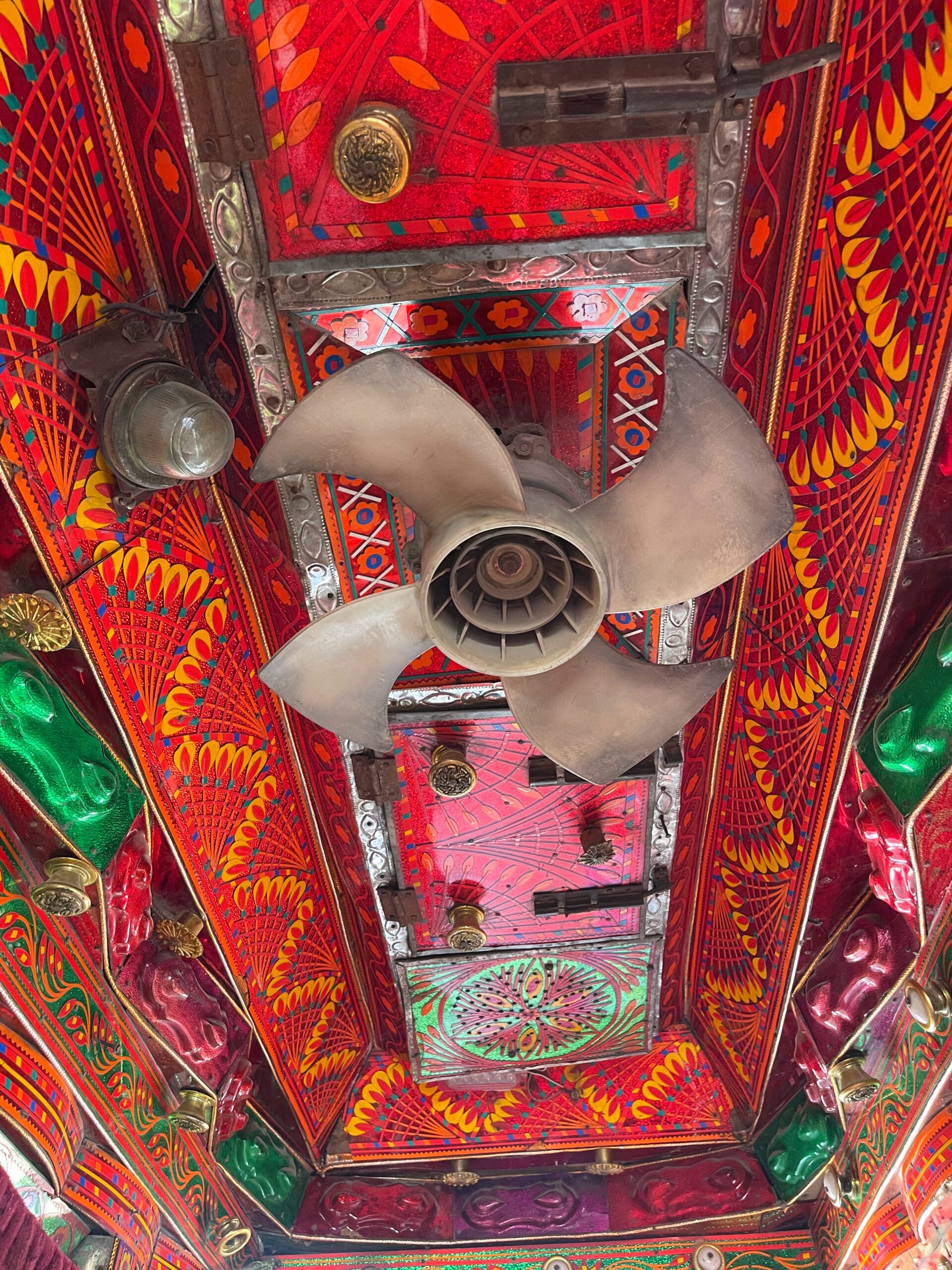 interior ceiling inside a pakistani truck, truck art