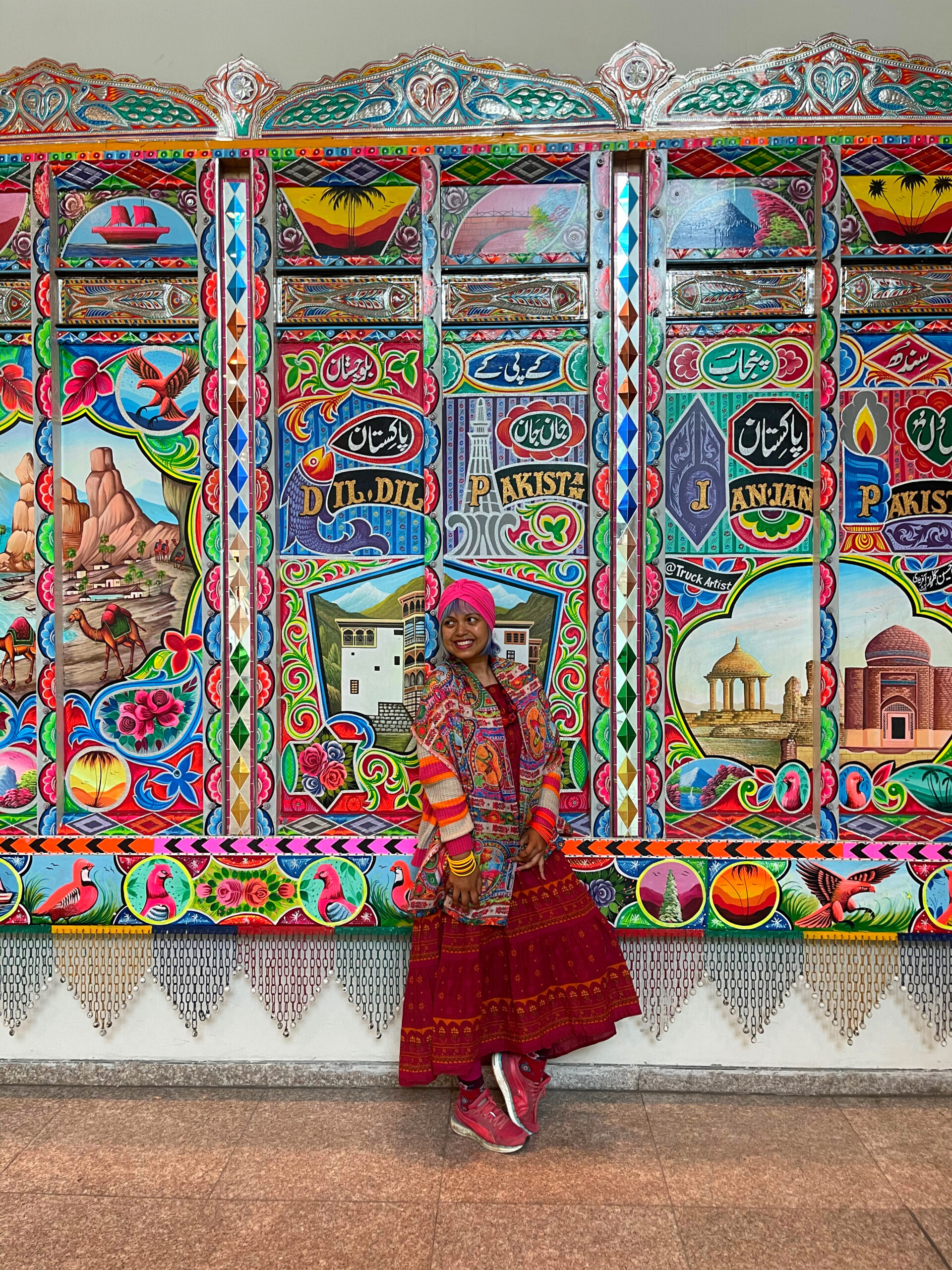 panels of colourful truck art at islamabad airport