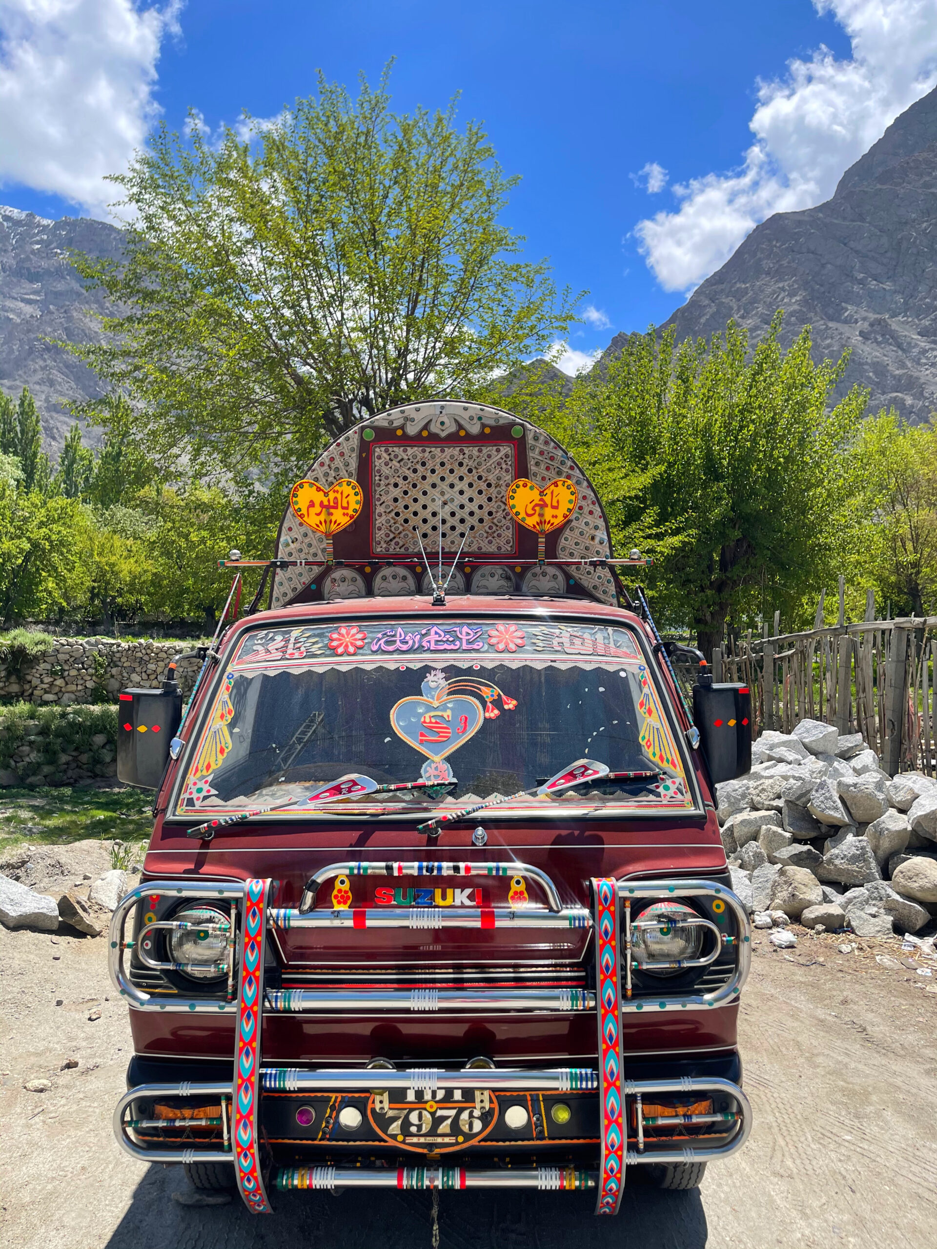public bus in skardu covered in colourful stickers 