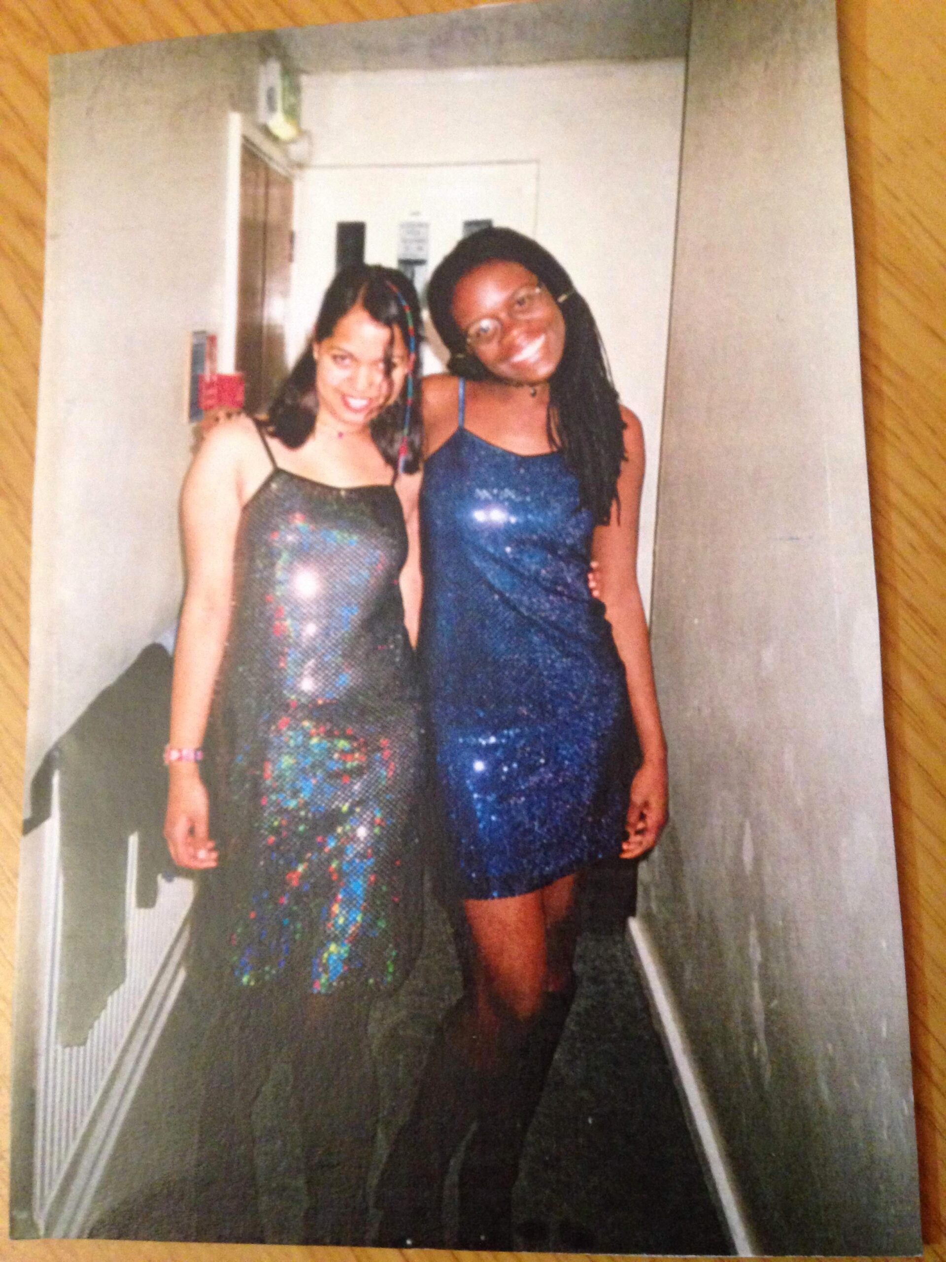 two gils wearing sequin dressed 